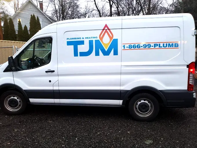 TJM Plumbing & Heating service van